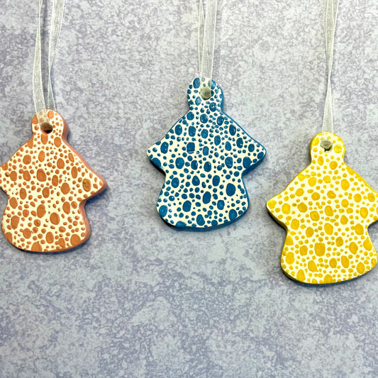 three hanging angel ornaments hand painted spot design , coral , blue and yellow